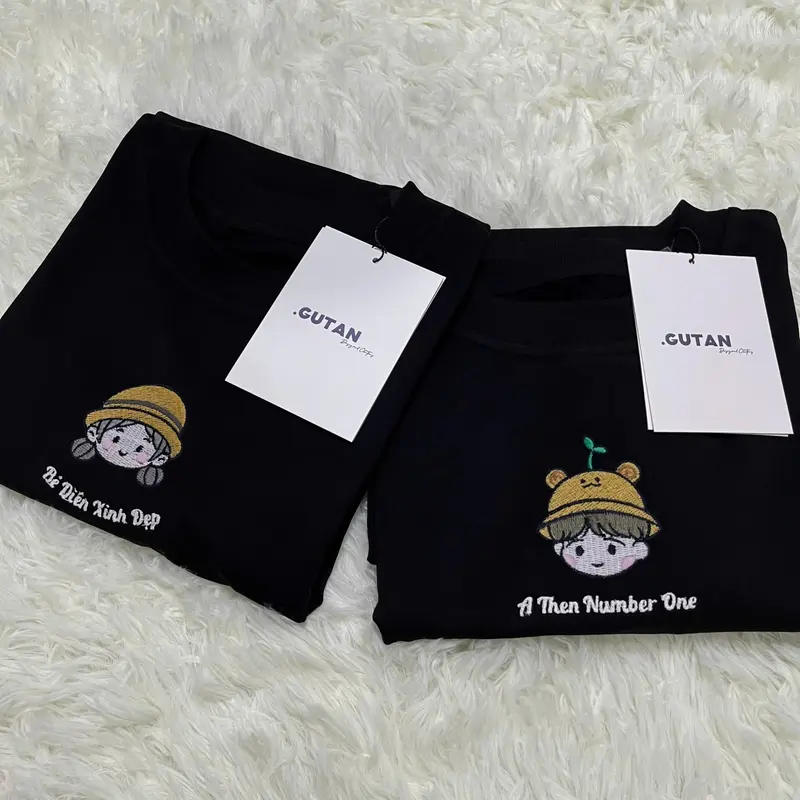 Áo Thun Thêu Hình Hoạt Hình Nam & Nữ - Image 1